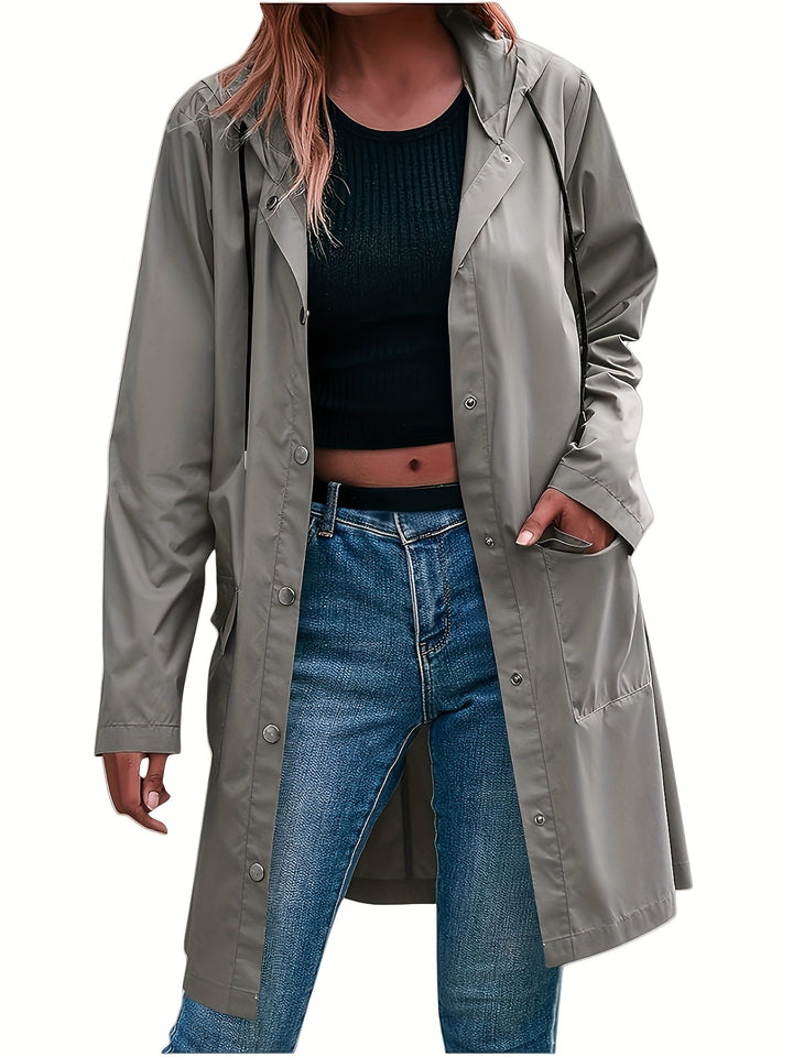 Grey hooded trench coat with snap front, long sleeves, and side pockets