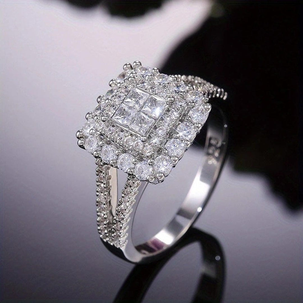 Square zirconia wedding ring with double halo and pavé band