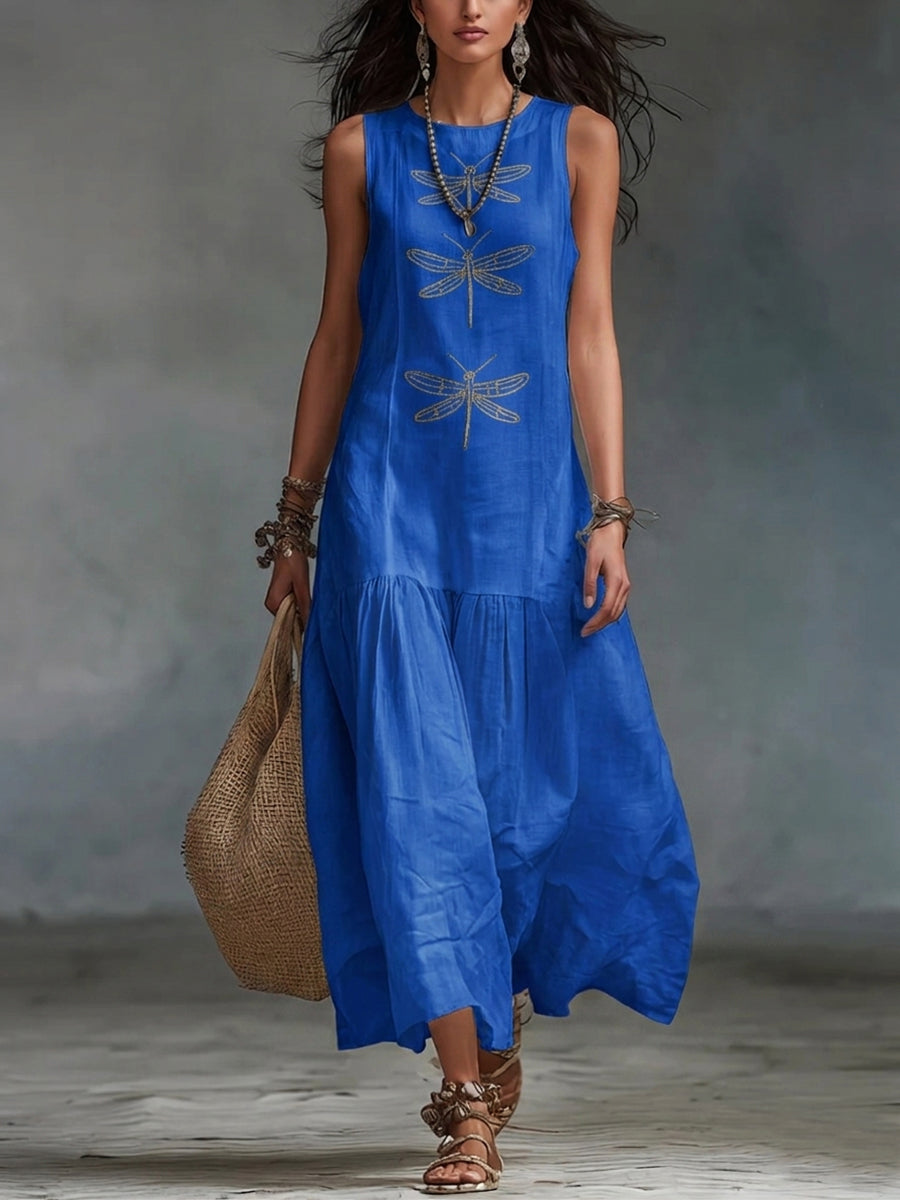 Blue sleeveless maxi dress with embroidered motifs and tiered, flowy hem