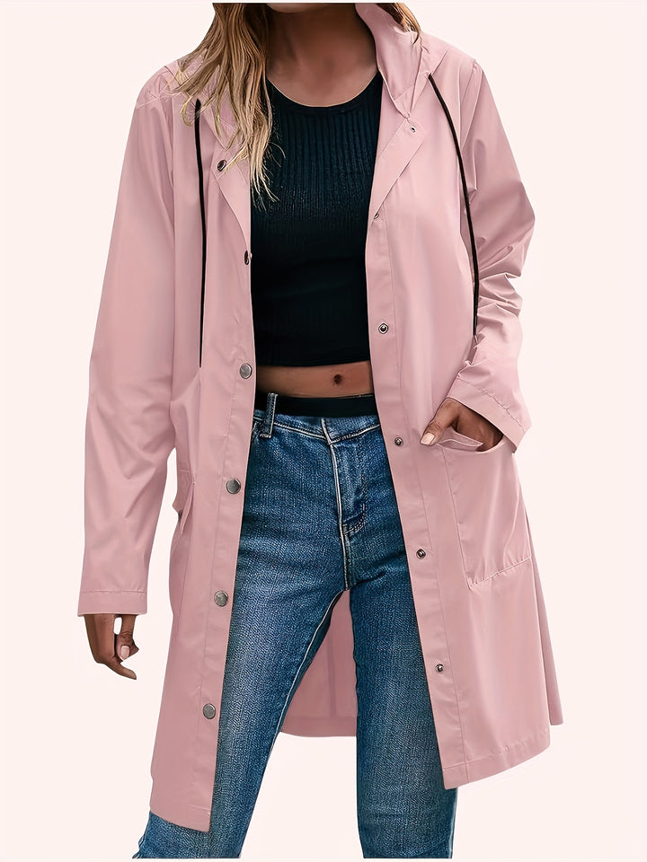 Pink hooded trench coat with snap front, long sleeves, and knee-length hem