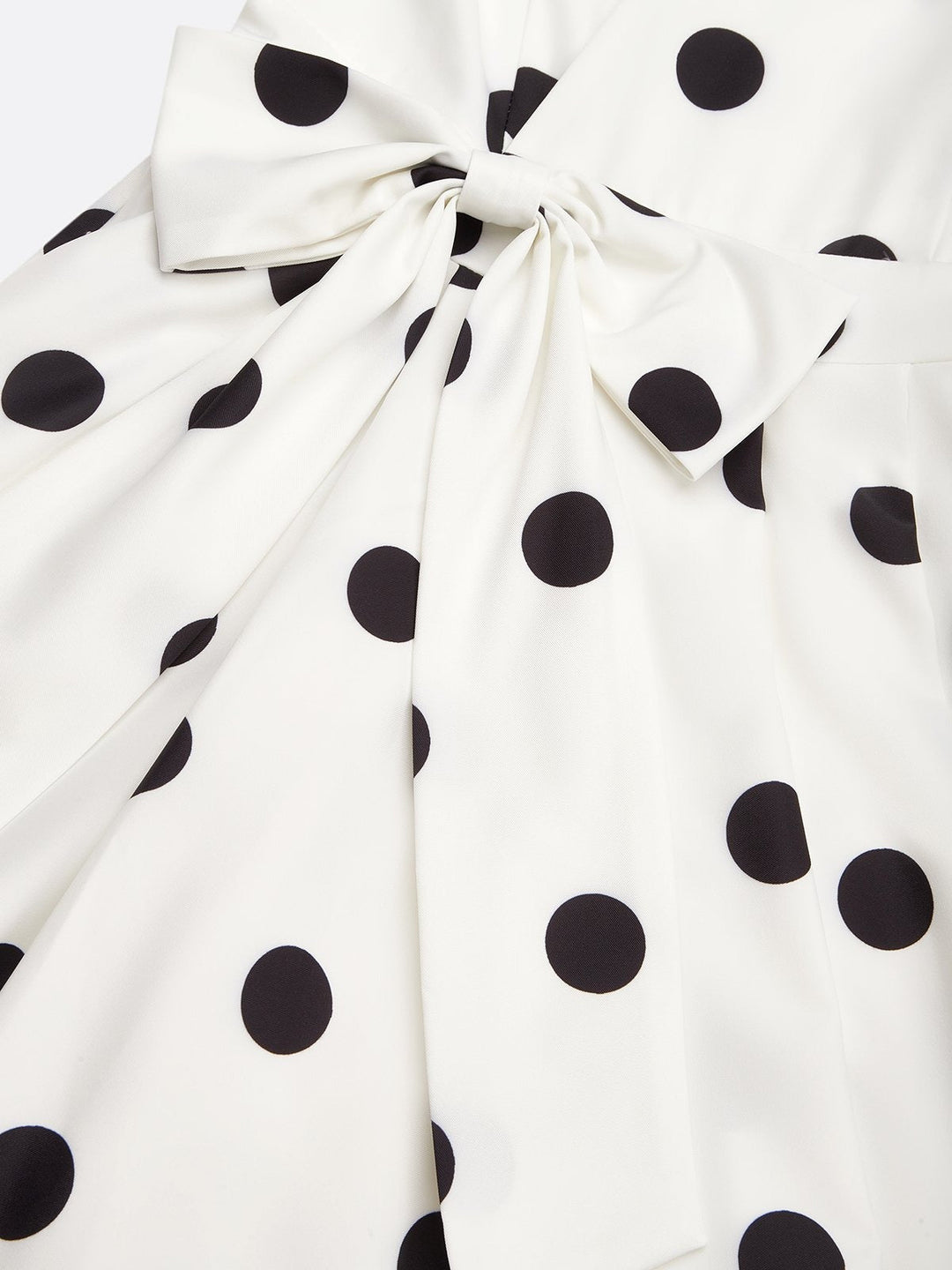 Black and white classic midi dress with polka dots and French sleeves