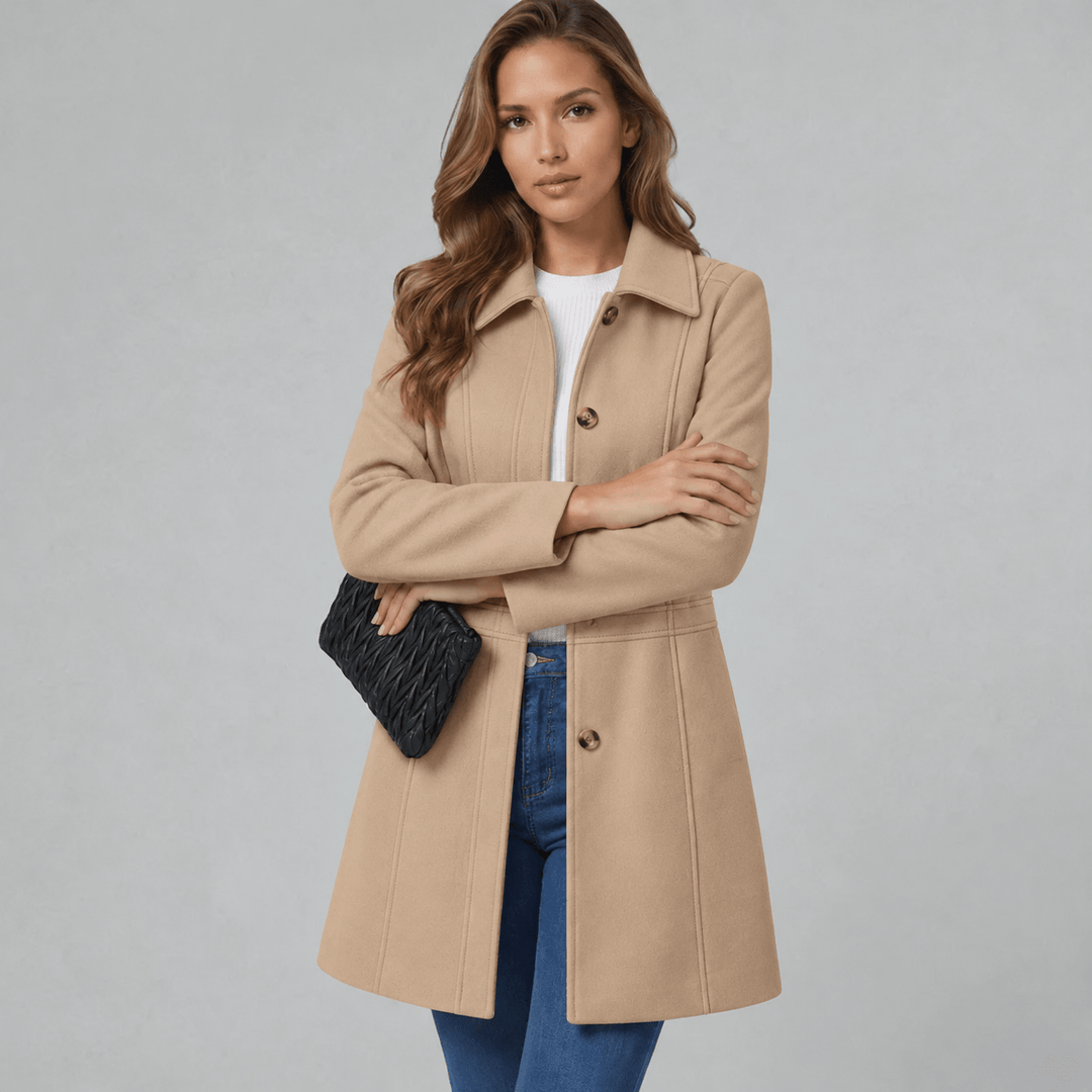 Women's tan button-front coat with notched lapels and long sleeves