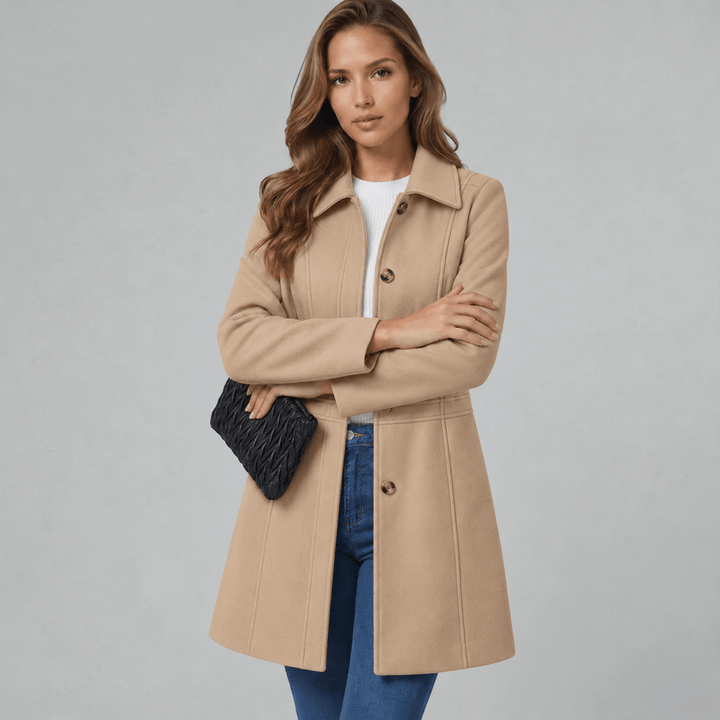 Women's tan button-front coat with notched lapels and long sleeves