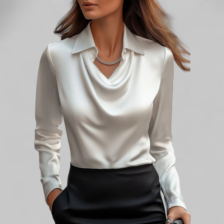 White satin draped cowl-neck blouse with long sleeves and tailored collar.